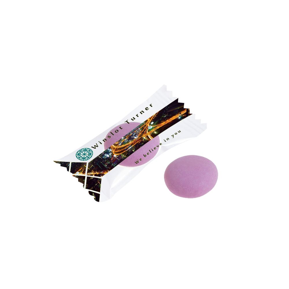 Flowpack met een Mentos mint - Transparant